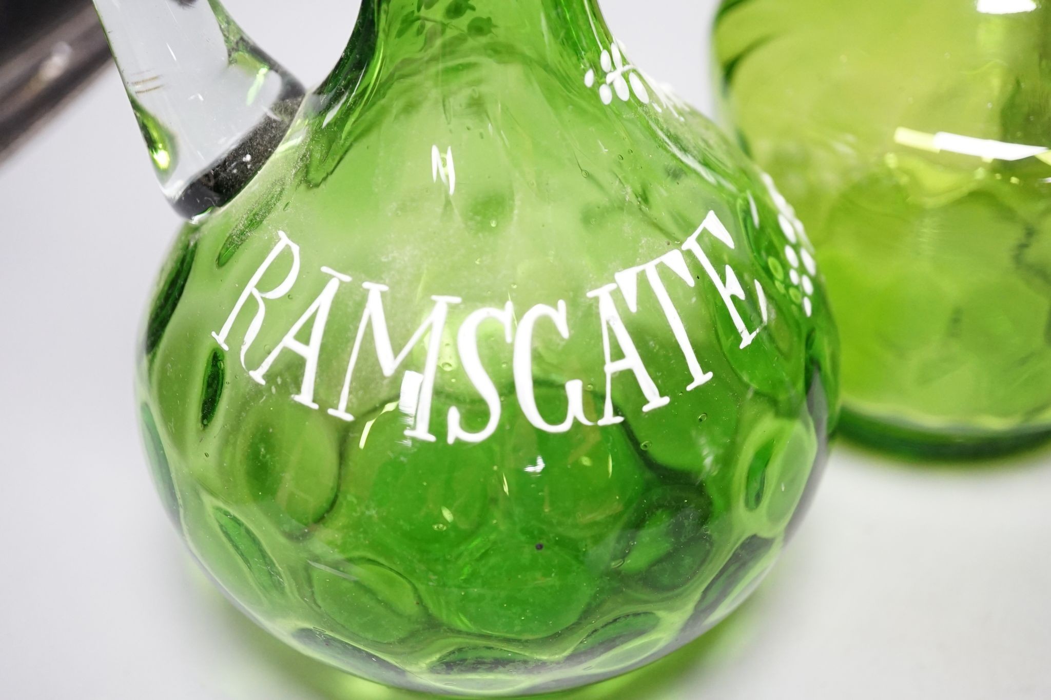 A group of six Victorian green glass decanters, including pair of Ramsgate souvenirs, 26cm